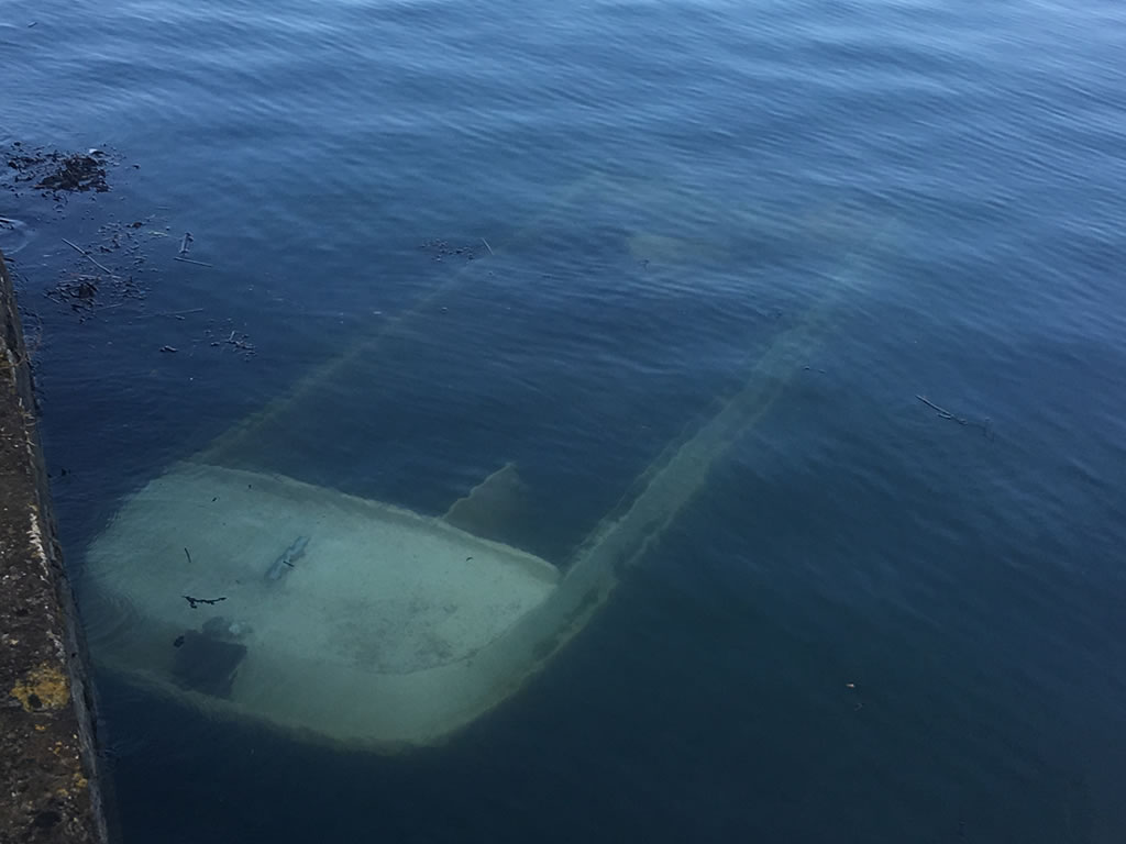 Recovering a Sunken Motorboat in Plymouth.