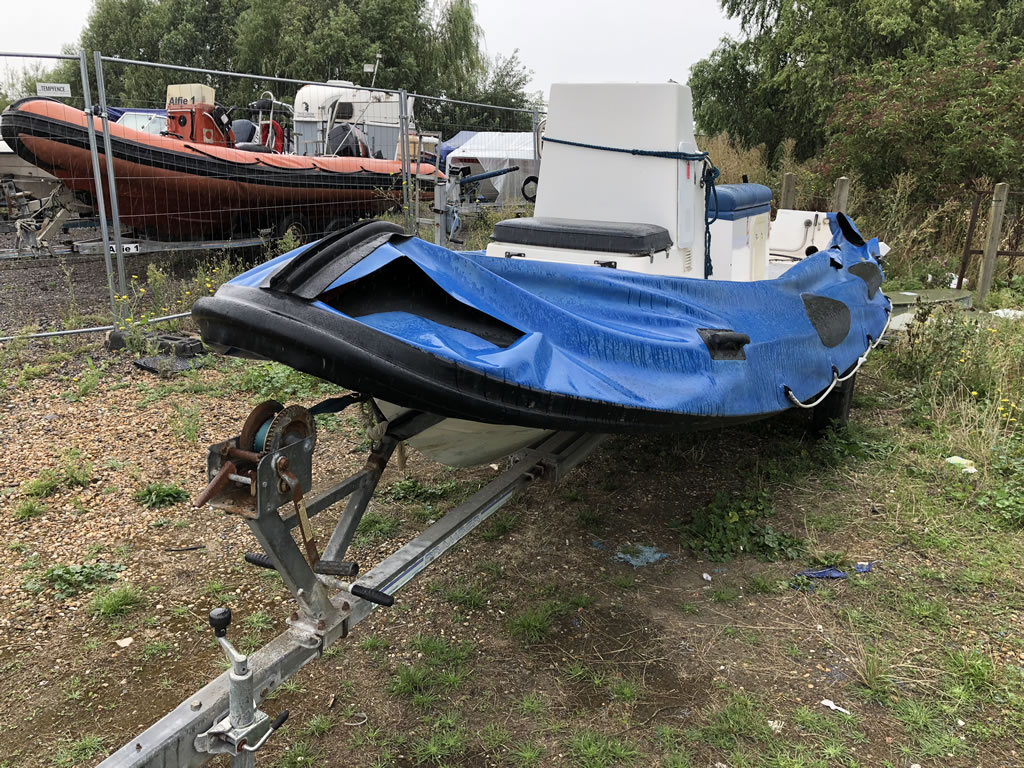 Scrap a Boat - A Rib Left unused and damaged.