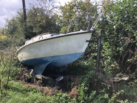 Boat in a Field Recycle a Yacht - Yacht in a Field