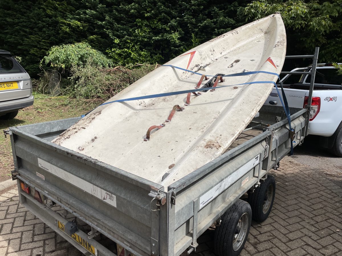 Dinghy Disposal from a Garden in West Sussex Boatbreakers