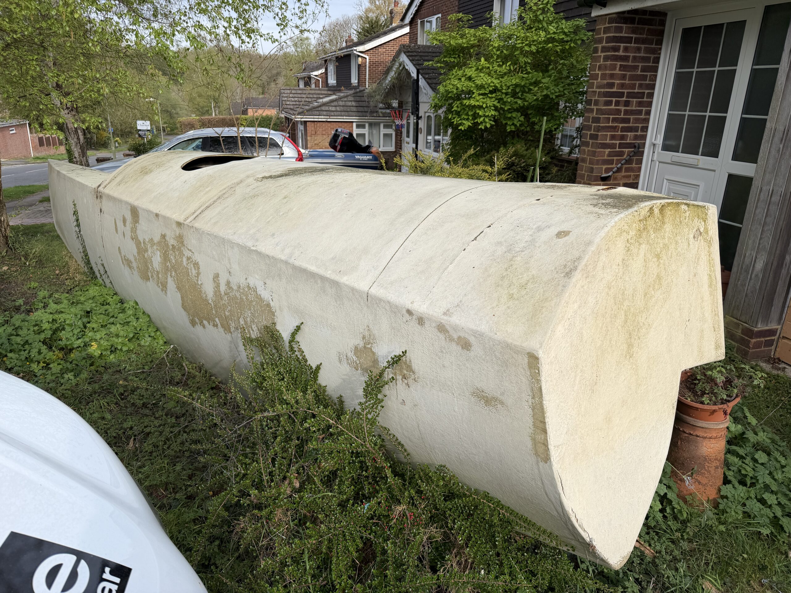 Catamaran Hulls in a Garden from Chandlers Ford